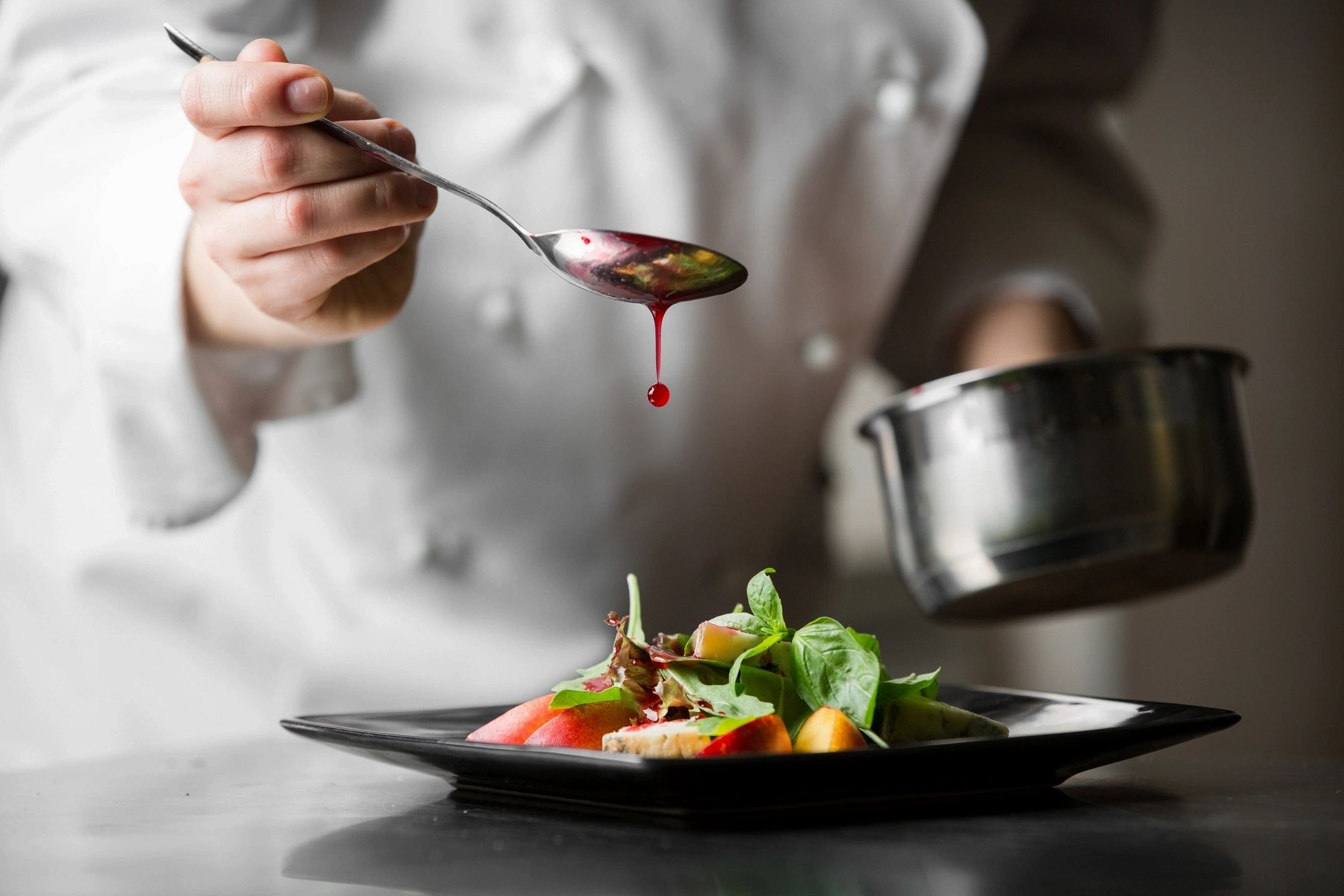 Restaurant Consulting — chef plating fine dining dish